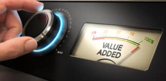Hand Turning A Knob Up To The Maximum With A