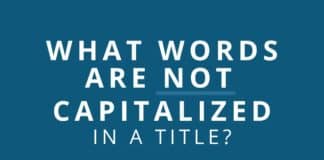 What words are not capitalized in a title featured image from Capitalize My Title.