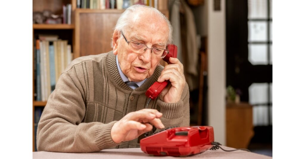 Old Man Listening To Phone