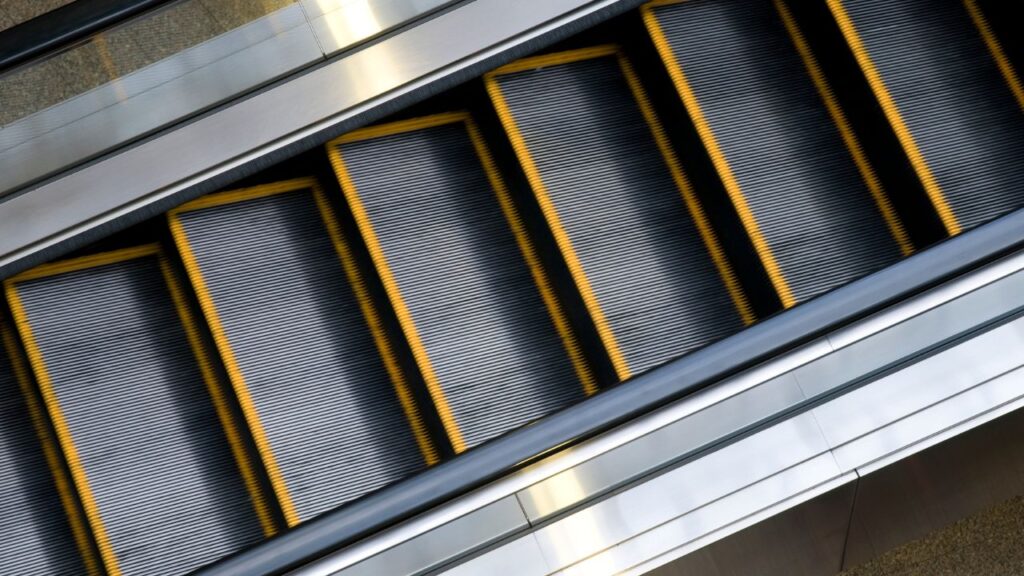 Photo of an escalator. 