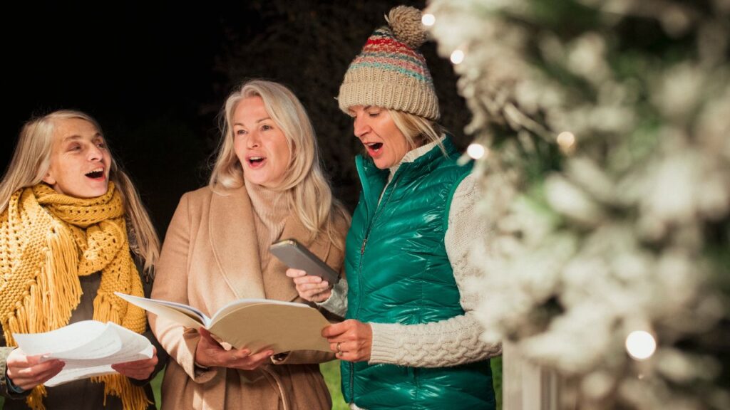 A family singing Christmas carols