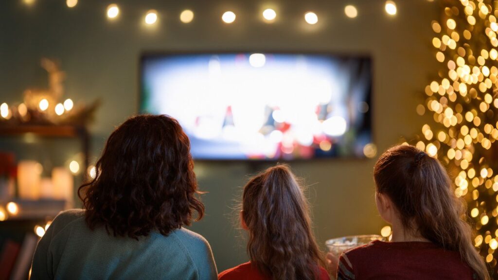 A family watching Christmas movies