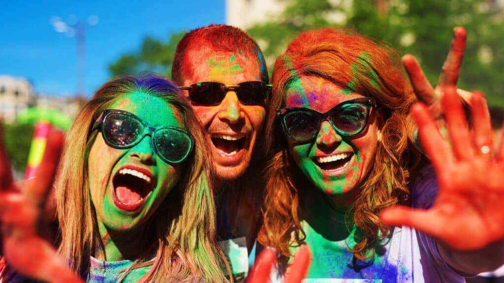 A group of friends celebrating Holi